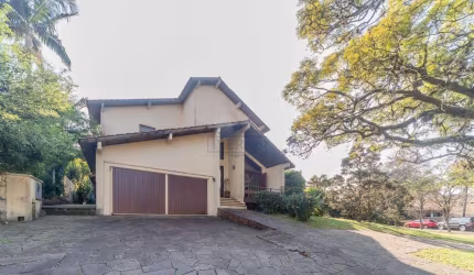 Casa em condomínio fechado com 4 quartos à venda na Avenida Firmino Octávio Bimbi, 255, Cavalhada, Porto Alegre por R$ 1.800.000