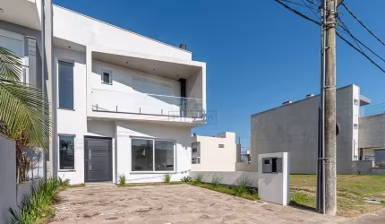 Casa em condomínio fechado com 3 quartos à venda na Rua Jorge Babot Miranda, 680, Aberta dos Morros, Porto Alegre por R$ 1.098.000