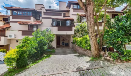 Casa em condomínio fechado com 3 quartos à venda na Avenida Wenceslau Escobar, 3714, Tristeza, Porto Alegre por R$ 750.000