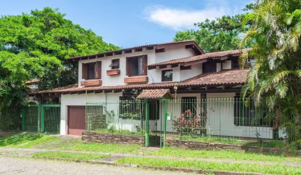 Casa com 4 quartos à venda na Rua General Tadeusz Kosciuszko, 115, Jardim Isabel, Porto Alegre por R$ 1.500.000
