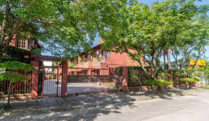 Casa em condomínio fechado com 3 quartos à venda na Avenida Coronel Marcos, 1608, Pedra Redonda, Porto Alegre por R$ 750.000