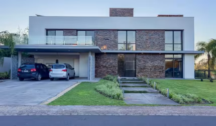 Casa em condomínio fechado com 5 quartos à venda na Avenida Juca Batista, 8000, Belém Novo, Porto Alegre por R$ 4.950.000