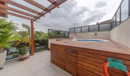 Casa em condomínio fechado com 3 quartos à venda na Rua Padre João Batista Reus, 526, Tristeza, Porto Alegre por R$ 1.200.000