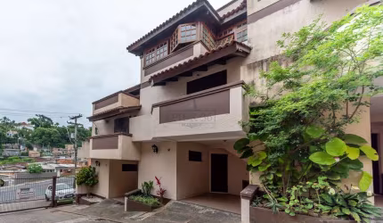 Casa em condomínio fechado com 3 quartos à venda na Avenida Wenceslau Escobar, 3714, Tristeza, Porto Alegre por R$ 590.000