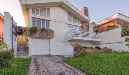 Casa com 3 quartos à venda na Rua Manauê, 76, Vila Assunção, Porto Alegre por R$ 1.200.000