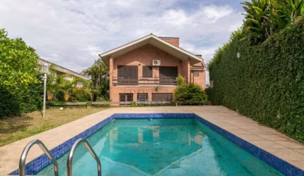 Casa com 3 quartos à venda na Rua Manauê, 60, Vila Assunção, Porto Alegre por R$ 1.190.000