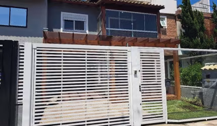Casa em condomínio fechado com 3 quartos à venda na Rua Aldo Sani, 84, Hípica, Porto Alegre por R$ 790.000
