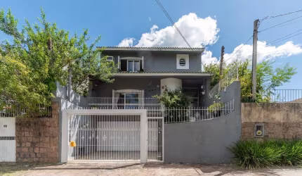 Casa com 3 quartos à venda na Rua Doutor Barcelos, 654, Tristeza, Porto Alegre por R$ 1.280.000