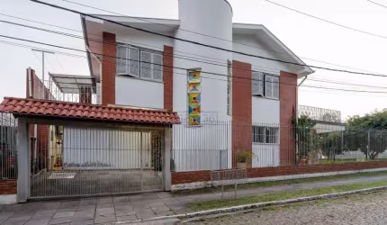 Casa com 4 quartos à venda na Rua Morano Calabro, 117, Jardim Isabel, Porto Alegre por R$ 1.690.000