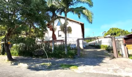 Casa em condomínio fechado com 3 quartos à venda na Rua Liberal, 643, Tristeza, Porto Alegre por R$ 600.000