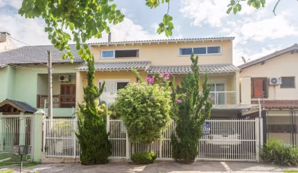 Casa com 4 quartos à venda na Rua Ancara, 381, Espírito Santo, Porto Alegre por R$ 960.000
