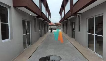 Village com 2 dormitórios para alugar, 80 m² por R$ 2.500,00/ano - Porto Novo - Caraguatatuba/SP