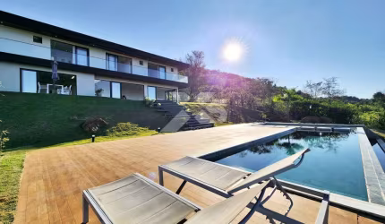 Condominio Itauna - CONDOMÍNIO ITAÚNA -  Chácara à venda ou permuta com 4 suítes e piscina - PORTEIRA FECHADA