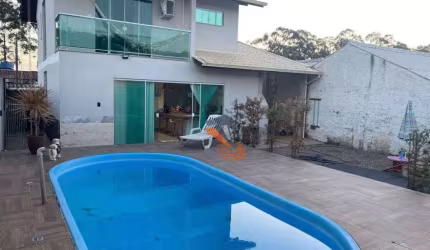 Casa com 3 dormitórios à venda, 160 m² por R$ 700.000,00 - Potecas - São José/SC