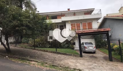 Casa com 6 quartos à venda em Menino Deus - RS