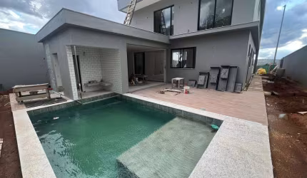 Casa de condomínio para venda possui 480 metros quadrados com 4 quartos