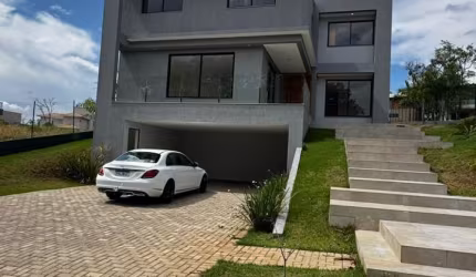 MARAVILHOSA MANSÃO ALTO PADRÃO ESTILO MODERNO EM CONDOMÍNIO FECHADO DE LAGOA SANTA.