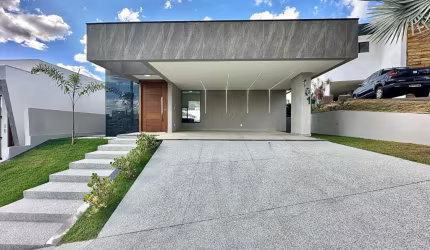 Casa moderna e espaçosa em condomínio fechado – Vespasiano/MG | 402m² de terreno | 185m² construídos | 3 suítes + escritório | Área gourmet completa