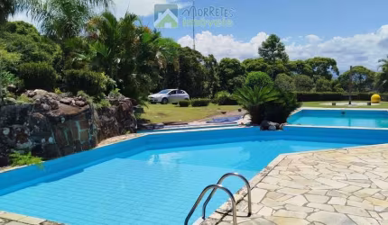 Terreno em condomínio fechado com 450m² acesso a piscinas e vista para o mar em Antonina