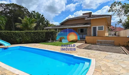 Casa com 4 dormitórios, 180 m² - venda por R$ 1.150.000,00 ou aluguel por R$ 5.000,00/mês - Bougainvillee V - Peruíbe/SP