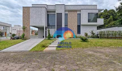 Sobrado em condomínio com 4 dormitórios à venda, 200 m² por R$ 2.000.000 - Bougainvillee IV - Peruíbe/SP