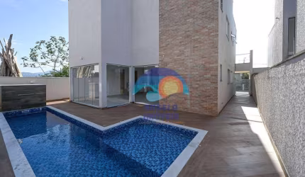 Sobrado com 4 dormitórios à venda, 242 m² por R$ 1.350.000,00 - Bougainvillee IV - Peruíbe/SP
