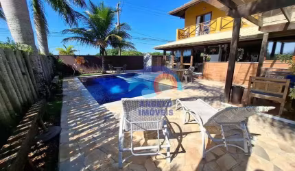 Sobrado com 5 dormitórios à venda, 339 m² por R$ 2.700.000 - Bougainvillee IV - Peruíbe/SP