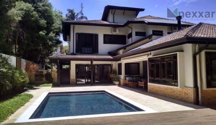 Casa com 4 dormitórios à venda, 447 m² por R$ 2.660.000,00 - Condomínio Chácara Flora - Valinhos/SP