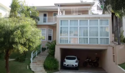 Casa com 3 dormitórios à venda, 329 m² por R$ 1.990.000,00 - Condomínio Millenium - Valinhos/SP