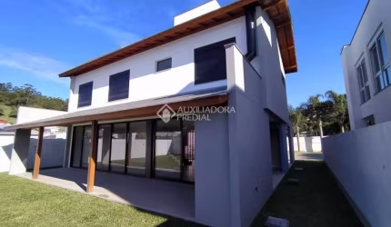 Casa em condomínio fechado com 4 quartos à venda na Rua Leonel Pereira, 2090, Cachoeira do Bom Jesus, Florianópolis, 230 m2 por R$ 1.980.000
