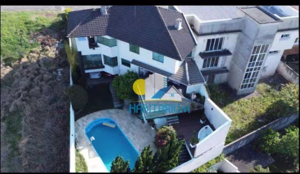 Casa com 5 dormitórios, 6 vagas, 590 m² - Tarumã - Curitiba/PR
