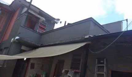 Sobrado com 3 dormitórios à venda, 204 m² por R$ 820.000 - Vila Mathias - Santos/SP