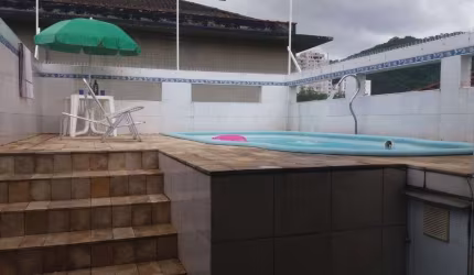 Casa com 3 dormitórios à venda, 268 m² por R$ 1.300.000 - Campo Grande - Santos/SP