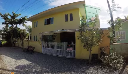 Casa com 3 dormitórios à 200m do mar,  à venda, 130 m² por R$ 790.000 - Itacolom