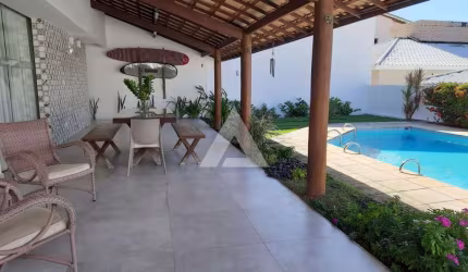 Casa em Vilas do Atlântico com 4 suítes, 317m² à venda por R$ 1.750.000,00