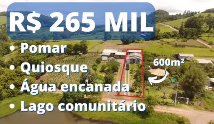 TERRENO RURAL COM CASA COM SUÍTE, POMAR E LAGO COMUNITÁRIO NA FRENTE EM IGREJINHA