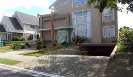 Excelente casa para venda ou locação Alphaville Pinhais, com 4 suites, 4 salas, 7 bh, moveis planejados todos ambientes, 4 garagens cobert, com 605 m²
