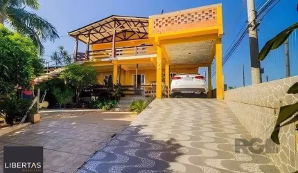 casa de 4 dormitórios,  no bairro Lomba do Pinheiro