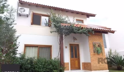 Excelente casa em condomínio com 3 dormitórios e 4 vagas.