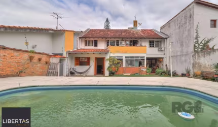 Casa a venda composta de 4 dormitórios no bairro Jardim Isabel em Porto Alegre