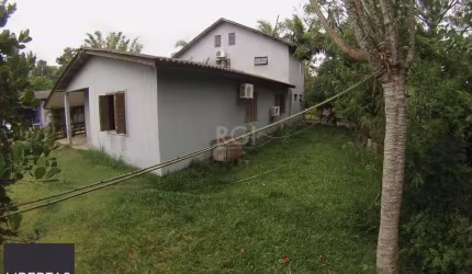 Casa 5 dormitórios no bairro Ponta Grossa