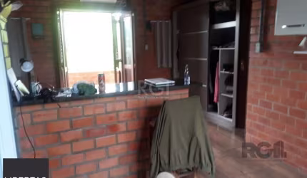 Casa com 3 dormitórios, sendo 1 suíte no bairro Hípica