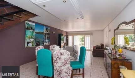 Casa Mista 266m² - 4 dormitórios, 1 suíte, 3 vagas no bairro Parque Santa Fé