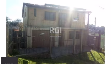 Casa para Venda - 634m², 2 dormitórios, sendo 1 suites, 3 vagas - Lomba do Pinheiro