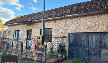Terreno de 300m² com casas, no bairro Cavalhada, Porto Alegre/RS