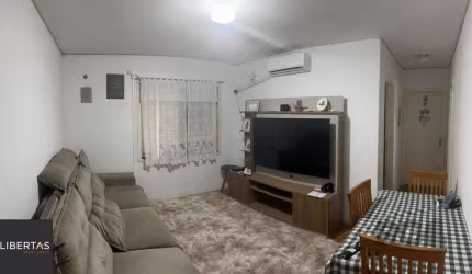 Apartamento de 2 dormitórios, living, cozinha, área de serviço e banheiro social.