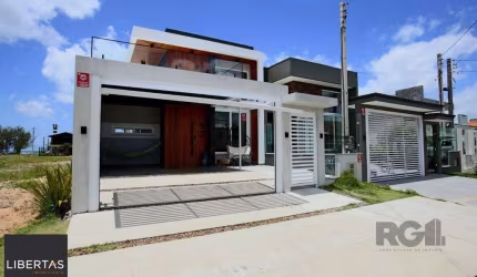 Casa 3 dormitórios à venda Zona Nova Capão da Canoa/RS