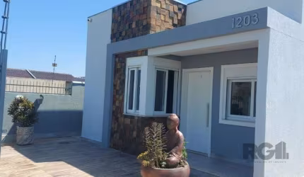 Casa com 2 dormitórios, sendo 1 suíte no bairro Florida em Guaíba
