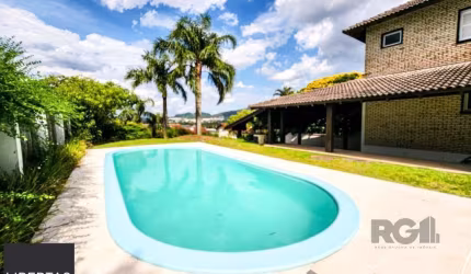 Casa de Condomínio em Cavalhada