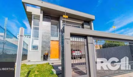 Casa 4 dormitórios à venda Marechal Rondon Canoas/RS